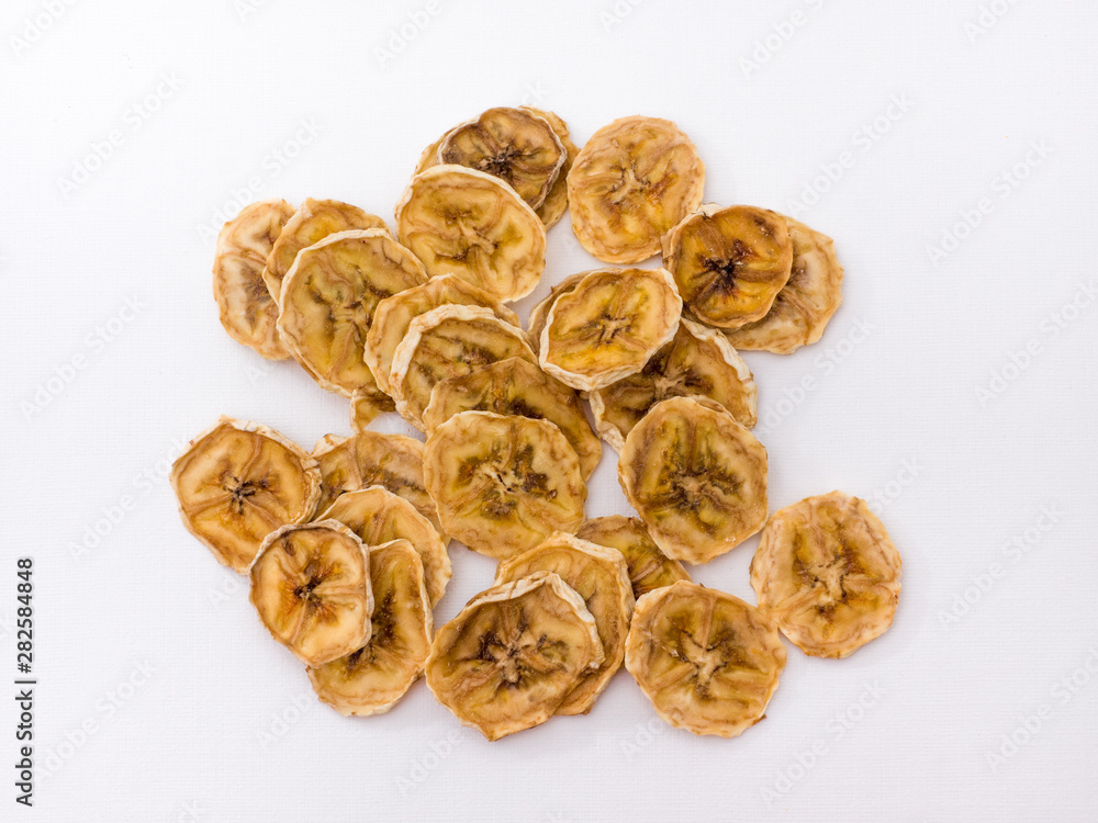 Banana chips on white background. Banana chips on white background.