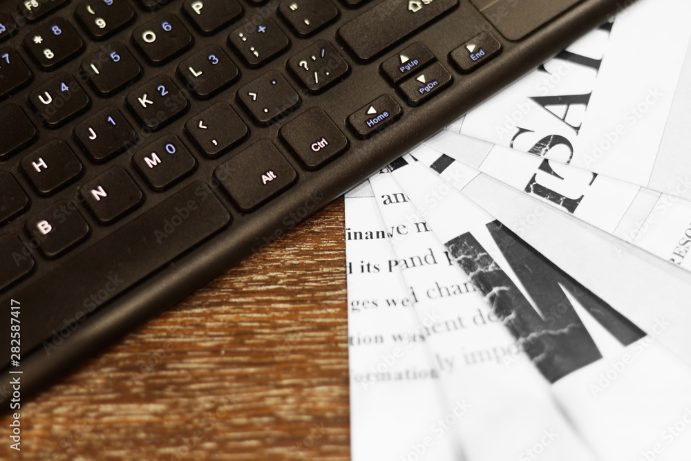 Concept for Journalism - Lots of Newspapers and Magazines Stacked in Pile and Computer Keyboard. News and Business Data in Tabloid Journals