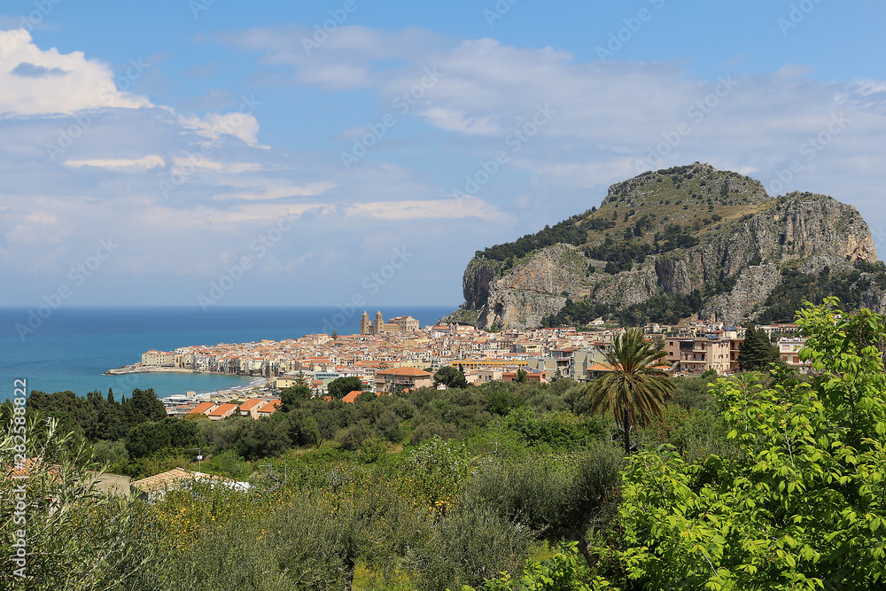 View at Cefalu at the base of 270m high limestone rock, Sicily