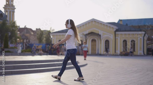 free free girl walks in a big bright city 4K