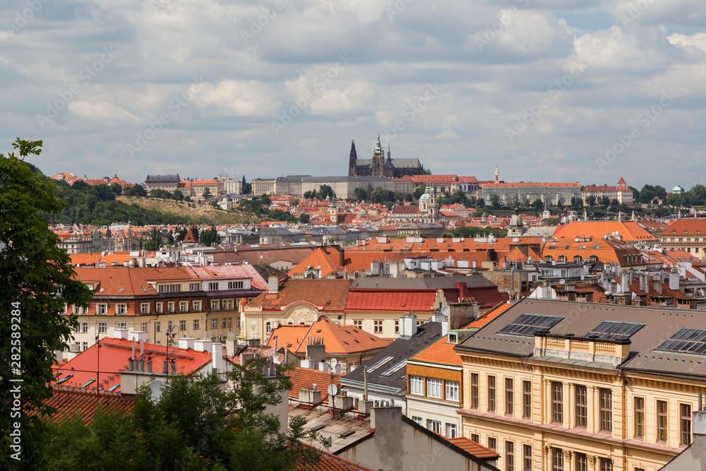 View of the Prague (Hradcany) Castle, St. Nicholas Church and downtown in Prague, Czech Republic, on a sunny day in the summer.
