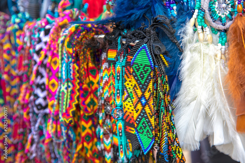 Bracelets made of beads of different colors at the fair of masters.