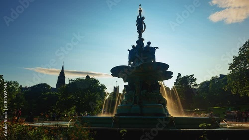 Time lapse view of the fountain in Princes garden in Edimburgh (Scotland) photo