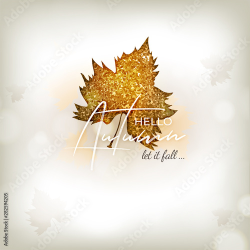 Stylish calligraphy text Hello Autumn let it fall with glittering golden mapple leaf on white blurred background. Can be used as greeting card or poster design.