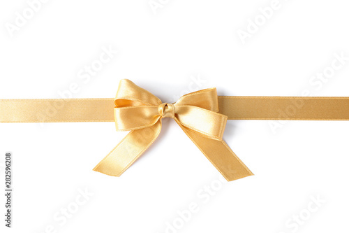 Golden ribbon with bow isolated on white background. Gift concept