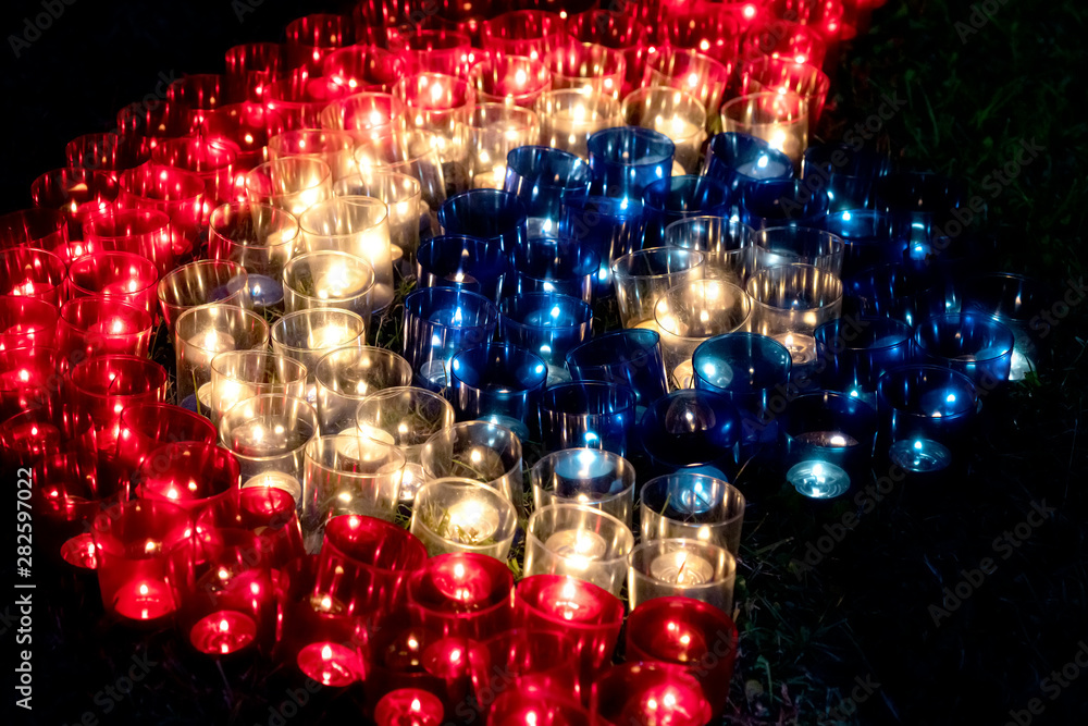 Candle light for the festival in red, blue and white colors