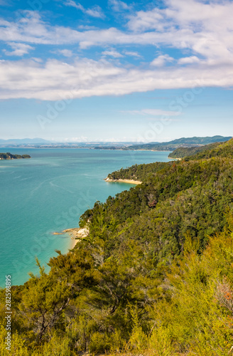 A view along the many bays and golden beaches at the incredibly beautiful Able Tasman National Park, South Island, New Zealand