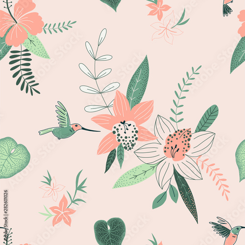 Tropical flowers color vector seamless pattern. Jungle plants background. Flying hummingbird. Exotic plants orchids and hibiscus. Decorative botanical textile, wallpaper, wrapping paper design