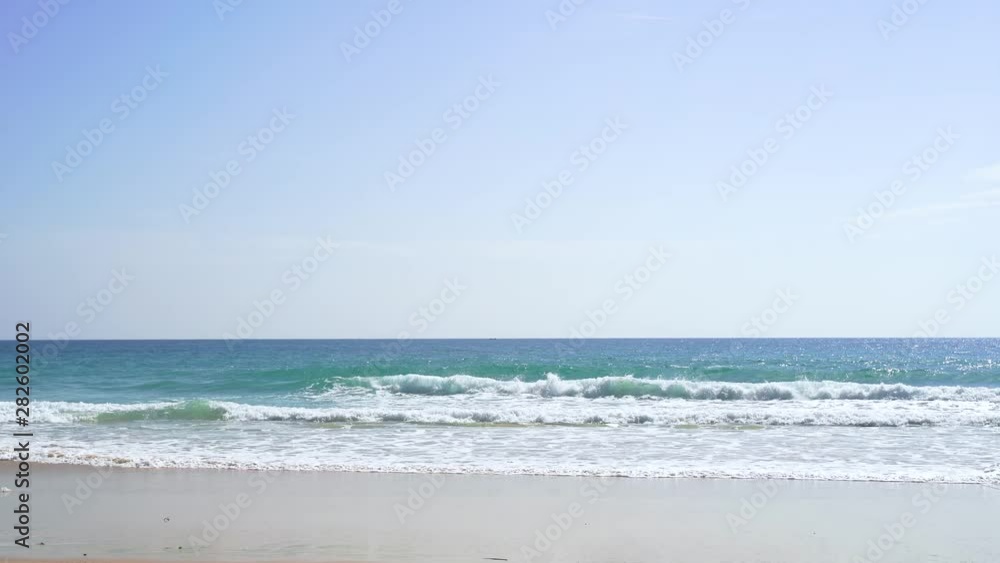 Tropical beach afternoon view, of the plane is down near the airport. tropical white sand beach. Sea waves seamless loop on the beautiful sand beach,Phuket Thailand. Tropical beach afternoon view, of the plane is down near the airport. tropical white sand beach. Sea waves seamless loop on the beautiful sand beach,Phuket Thailand.