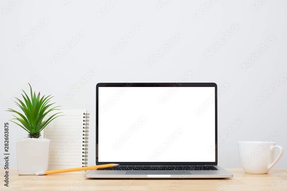 Laptop computer blank screen on wood desk. Minimal style desk. Laptop computer blank screen on wood desk. Minimal style desk.