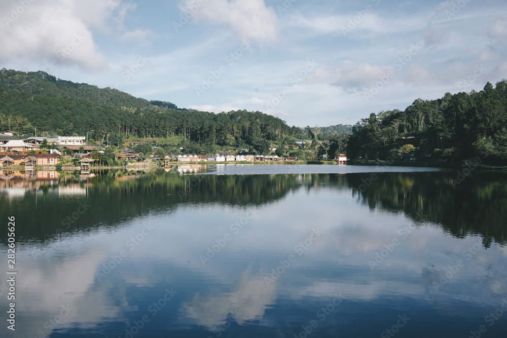 Fototapeta premium Landscape of beautiful lake in the morning at Ban Rak Thai, North of Thailand