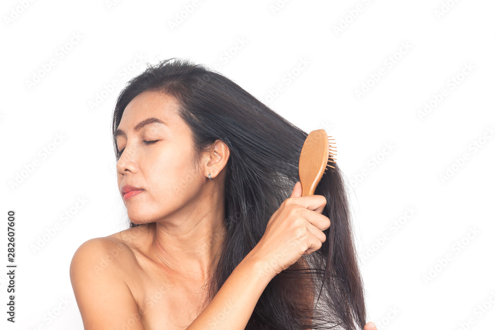 Fototapeta premium Beautiful of age 40+ Asian woman long black hair on white background. Health and surgery concept