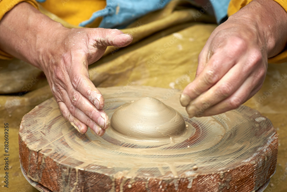 Closeup of a potter's hand