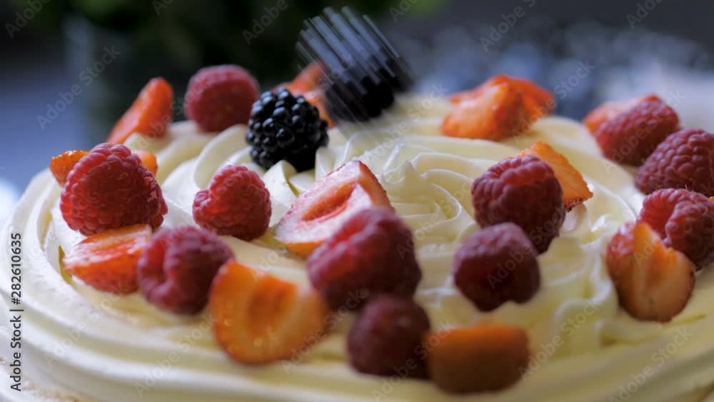 The process of making dessert Anna Pavlova with berries and cream The process of making dessert Anna Pavlova with berries and cream