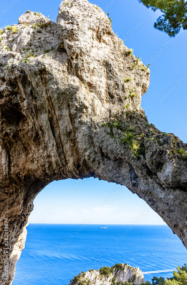 Italy, Capri, panorama and details of the Natural Arch