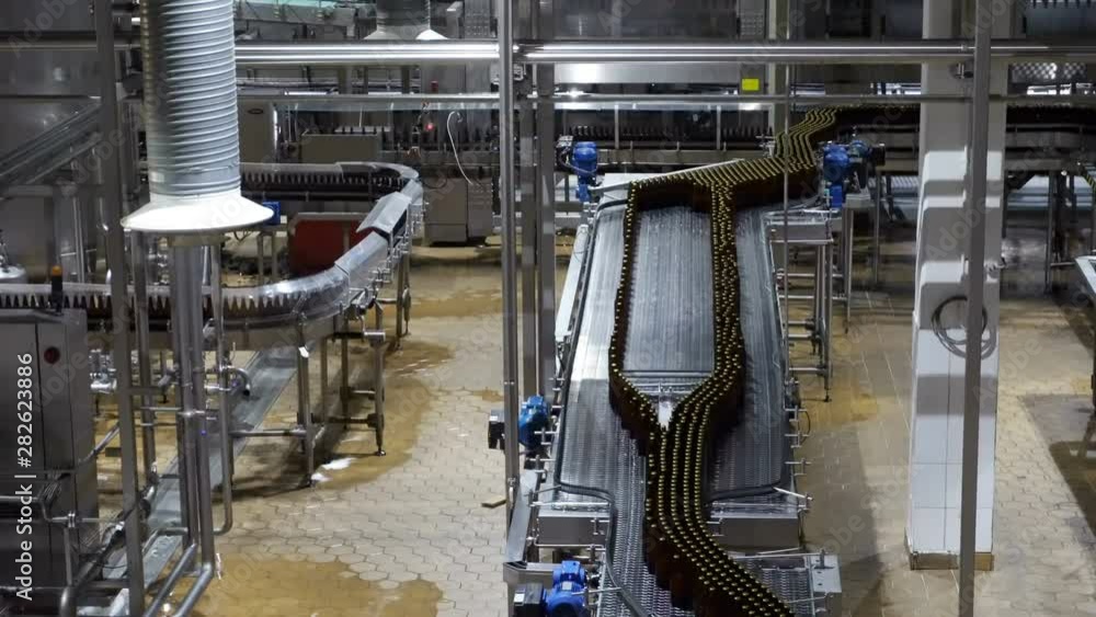 Beer factory interior with a lot of machines Beer factory interior with a lot of machines