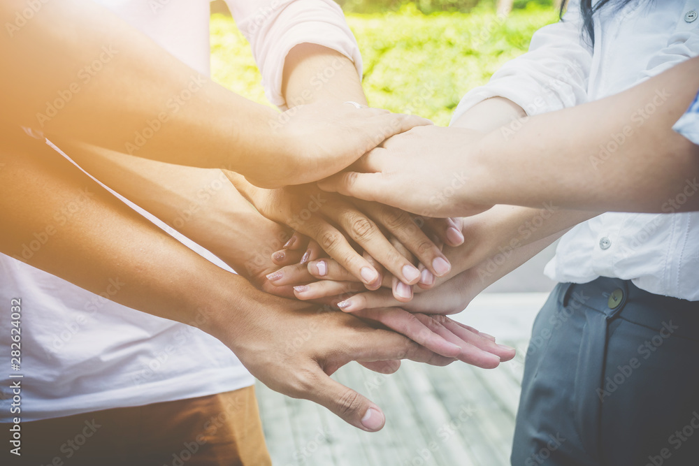 Team teamwork business join hand together concept. Power of male and female volunteer charity work. Success business startup Team teamwork business join hand together concept. Power of male and female volunteer charity work. Success business startup