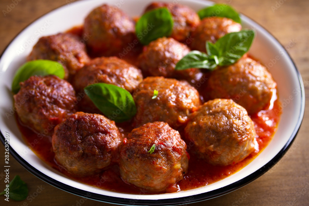 Meatballs in tomato sauce. Home made food. Concept for a tasty and healthy meal Meatballs in tomato sauce. Home made food. Concept for a tasty and healthy meal