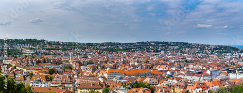 Obraz na płótnie Germany, XXL panorama of stuttgart city district west houses and red roofs from above aerial view on sunny summer day with blue sky w salonie