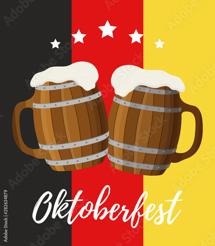 Oktoberfest concept, two wooden tankards, mug and cup