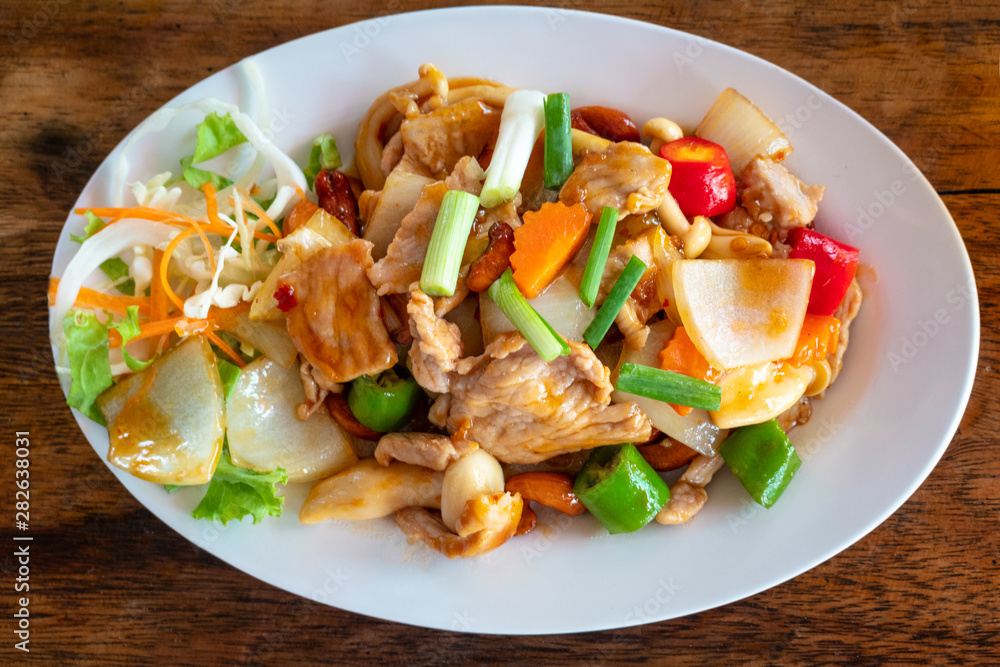 Fried pork served with spicy sweet vegetables. Fried pork served with spicy sweet vegetables.
