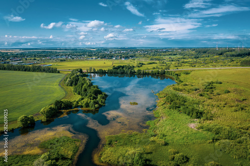 Summer panoramic view of the lake. Russian plain.