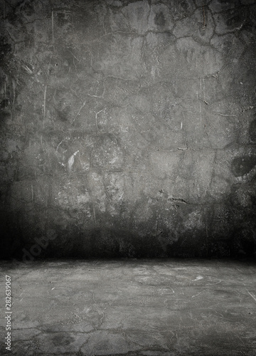 grunge interior room with concrete wall.