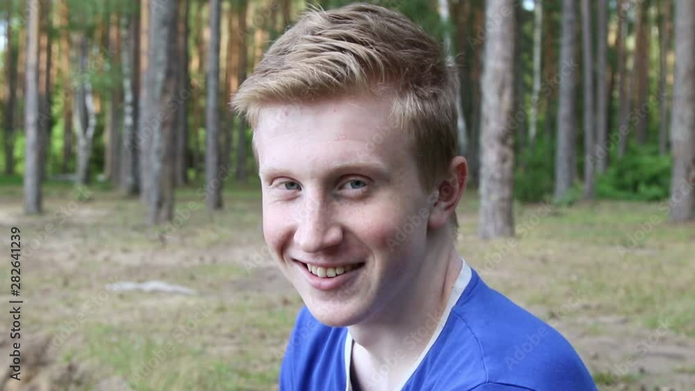 Portrait of teenager outdoors on blurred background. Portrait of teenager outdoors on blurred background.