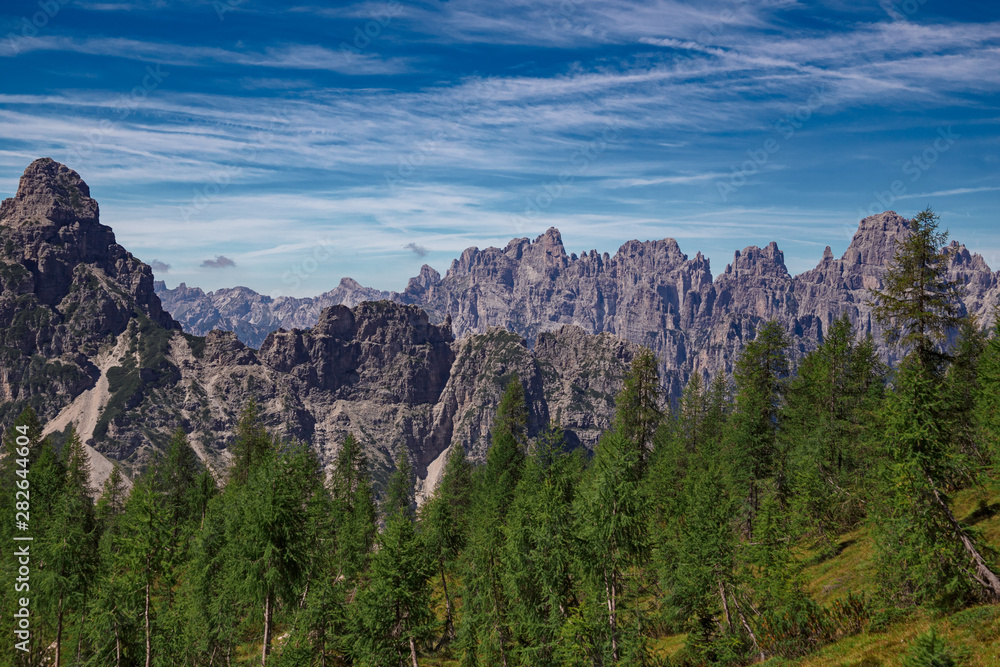 Panoramic view of towers and peaks of the Friuli Dolomites, in the morning light, in Friuli, Italy.