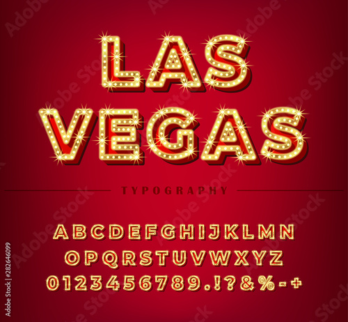 3d light bulb alphabet with gold frame isolated on dark red background.