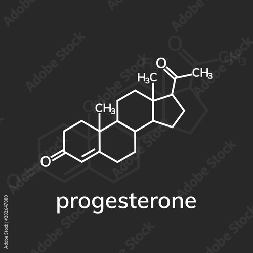 Progesterone chemical formula on dark background