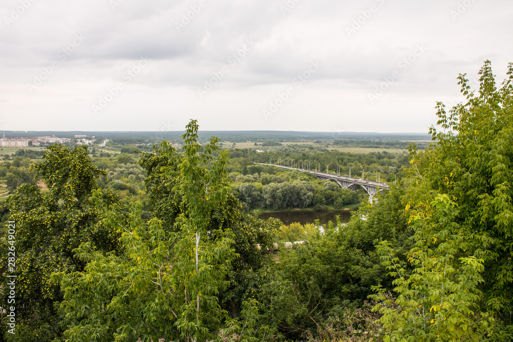 Panorama of the valley with a car bridge over the river Klyazma summer day in Vladimir Russia Panorama of the valley with a car bridge over the river Klyazma summer day in Vladimir Russia