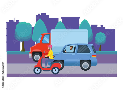 Vehicles and motorcycle with drivers riding