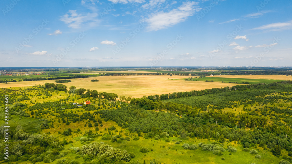 Beautiful drone shot of Ukrainian landscape. Natural background on a sunny day. Photo of the countryside.