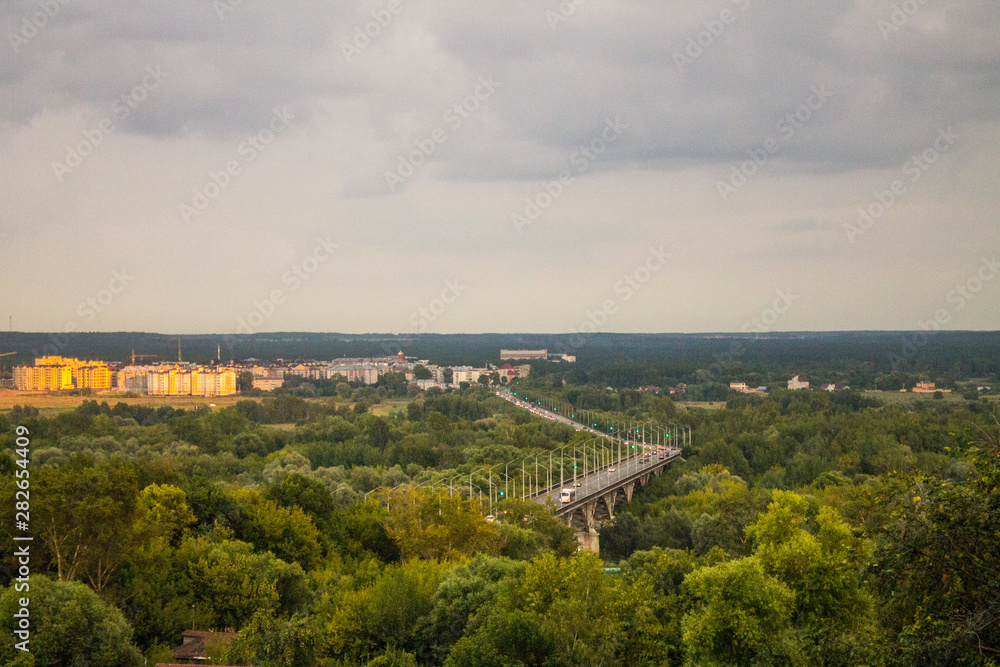 Panorama of the valley with a car bridge over the river Klyazma summer day in Vladimir Russia