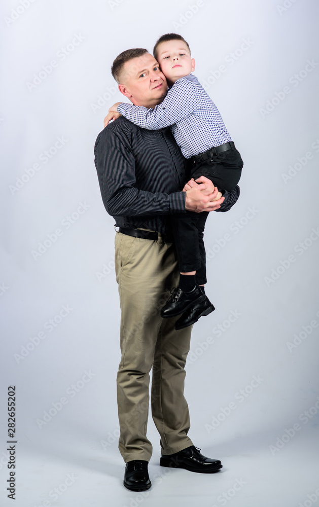 Parenthood concept. Fathers day. Father example of noble human. Family bonds. Family support. Real men. Trustful relations father and son. Father little son. Best friends. Dad and adorable child Parenthood concept. Fathers day. Father example of noble human. Family bonds. Family support. Real men. Trustful relations father and son. Father little son. Best friends. Dad and adorable child