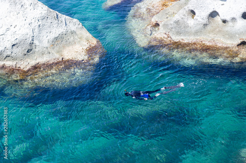 Bild auf Leinwand diving sub and rock in transparent Mediterranean sea in ischia forio
