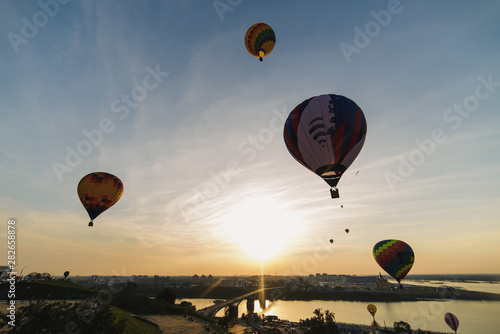 Colorful balloons flying over Nizhny Novgorod Russia at sunset