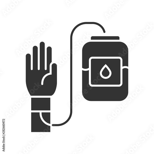 Donorship glyph icon. Blood donation and transfusion. Volunteer activity. World Donor Day. Medical treatment. Donor hand and blood bag. Silhouette symbol. Negative space. Vector isolated illustration