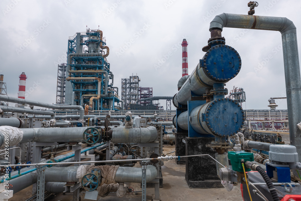 view of the refinery against the cloudy sky view of the refinery against the cloudy sky