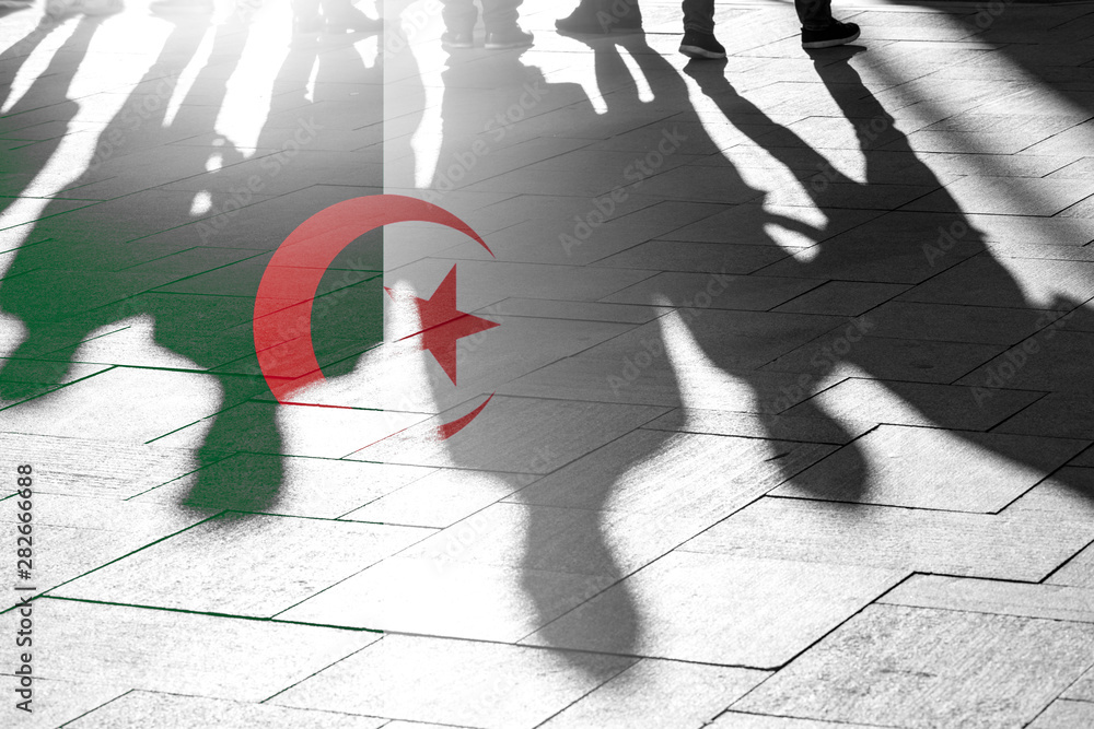 Φωτογραφία Algeria Flag and Shadows of People as citizens of Country, conceptual Picture