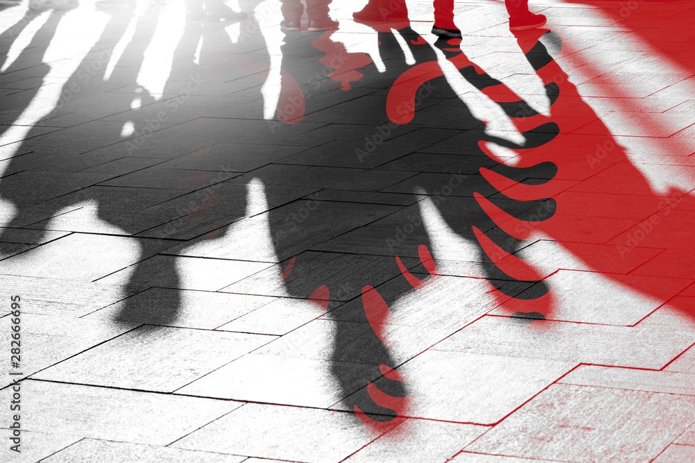 Φωτογραφία Albanian Flag and Shadows of People as citizens of Country, conceptual Picture