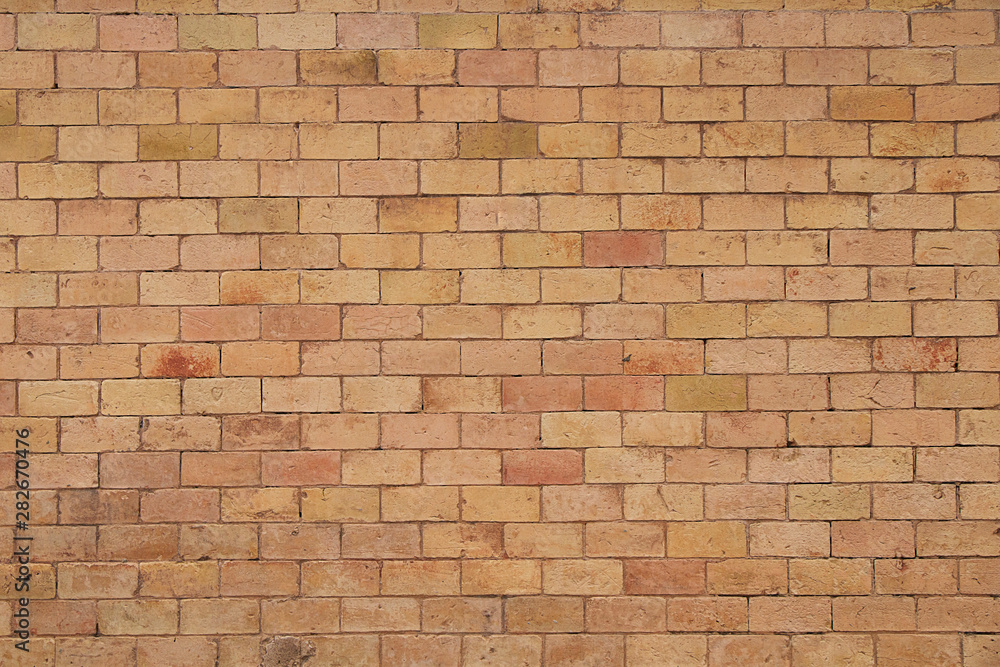 Fototapeta premium Background of stones and cobblestones. Fragment of a brick wall.