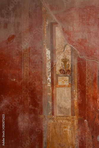 Colorful frescos on the walls of antique interior. Pompeii