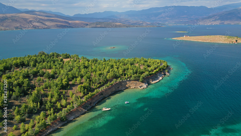 Fototapeta premium Aerial drone photo of famous seaside area and forest of Kentri in picturesque village and port of Galaxidi, Fokida, Greece