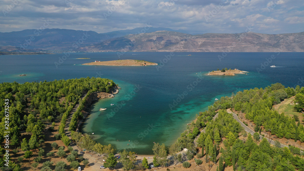 Aerial drone photo of famous seaside area and forest of Kentri in picturesque village and port of Galaxidi, Fokida, Greece