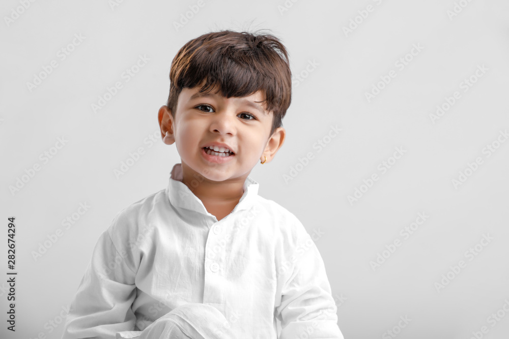 Indian little boy in Traditional Wear and Showing multi pal expression Indian little boy in Traditional Wear and Showing multi pal expression