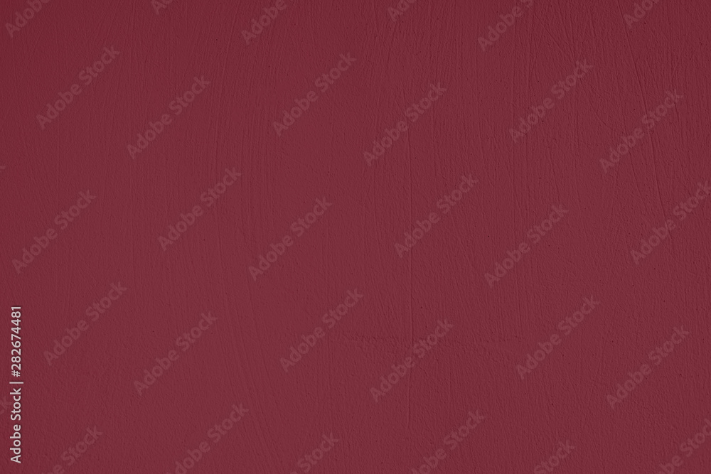 Fototapeta premium Dark red Concrete textured background to your concept or product. Winter 2020 color trend.