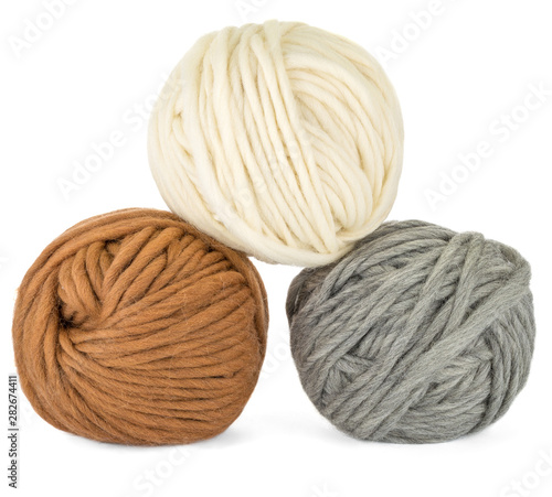 Three balls of yarn on white background