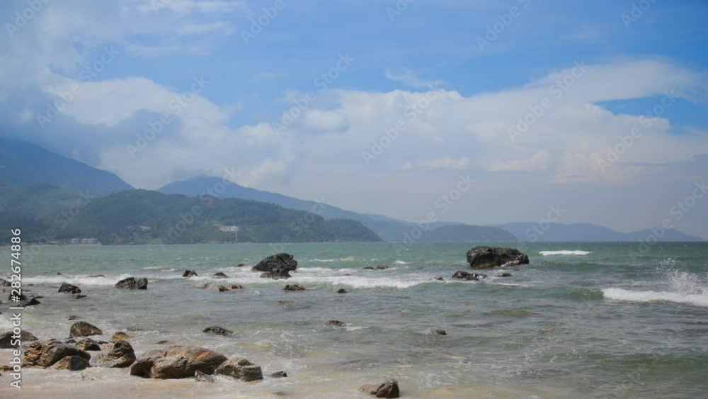 The beach is windy. Full of rocks , Danang, Vietnam The beach is windy. Full of rocks , Danang, Vietnam